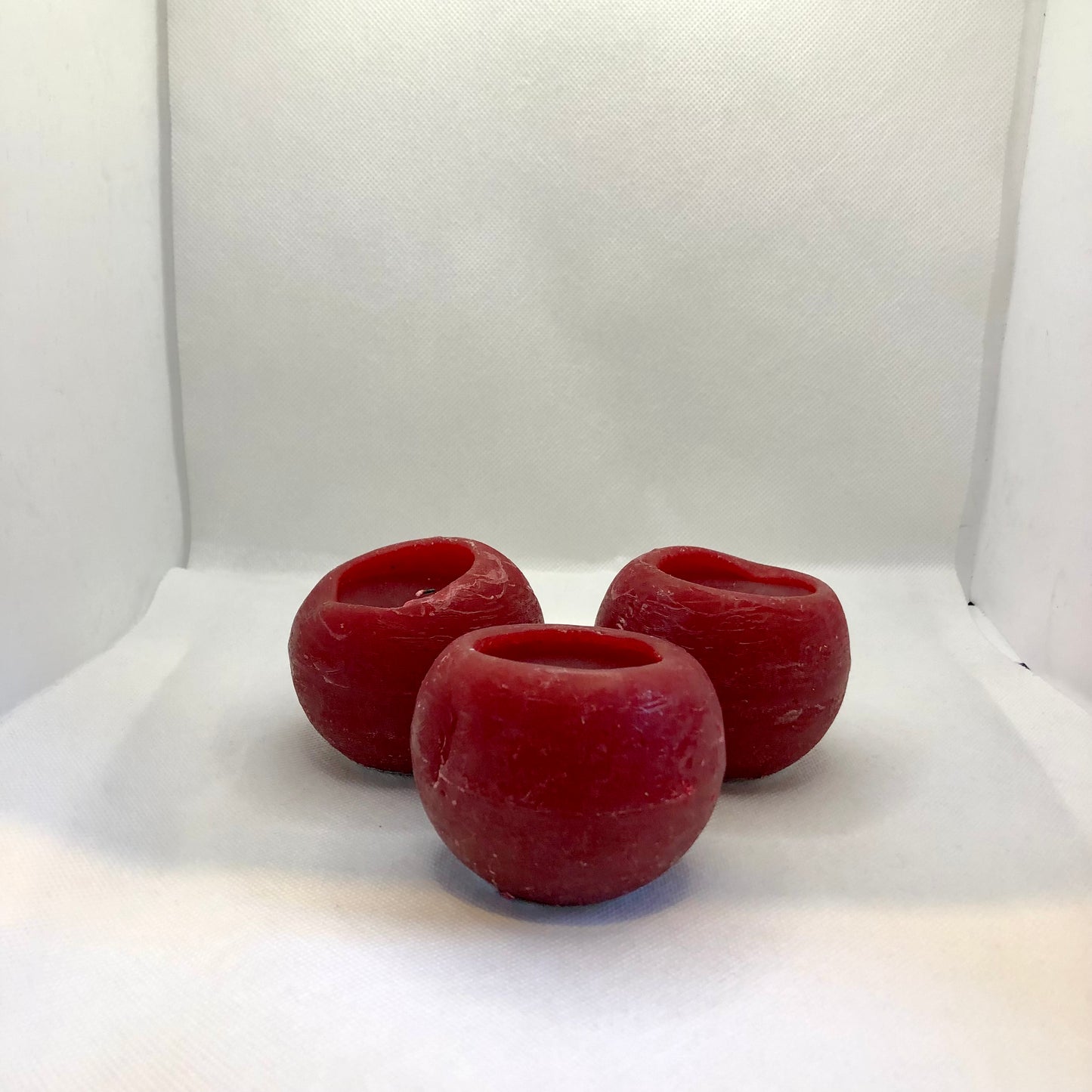 Lot de 3 bougies rouges entamées